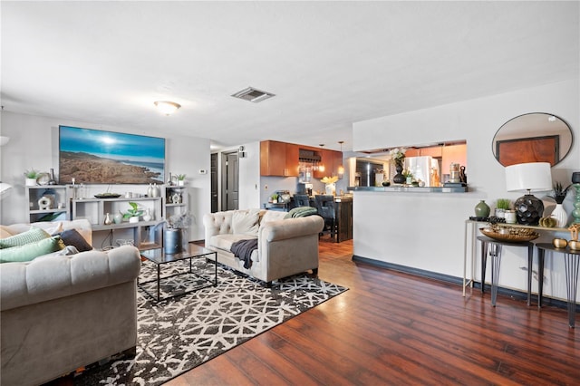 living room featuring dark hardwood / wood-style floors