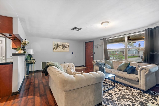 living room featuring dark hardwood / wood-style floors