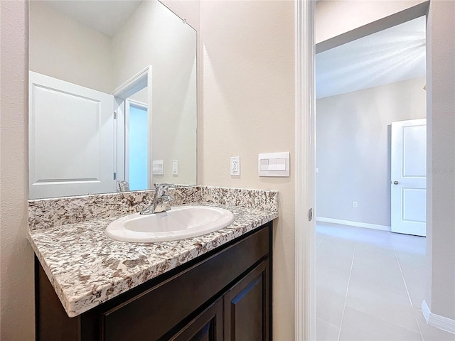 bathroom featuring vanity and tile patterned floors