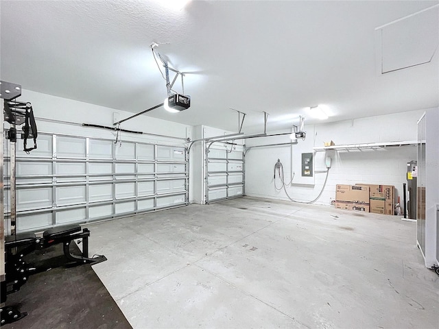 garage featuring electric panel and a garage door opener