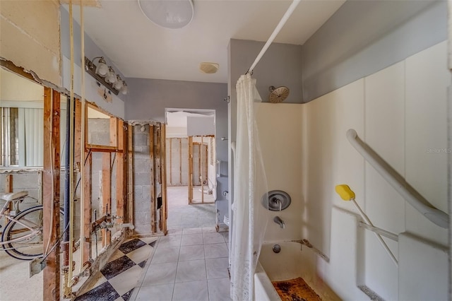 bathroom with tile patterned floors and shower / bathtub combination with curtain