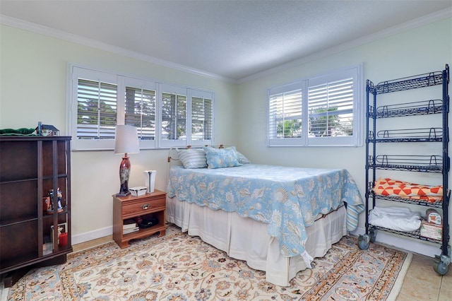 bedroom featuring crown molding