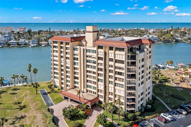 birds eye view of property featuring a water view