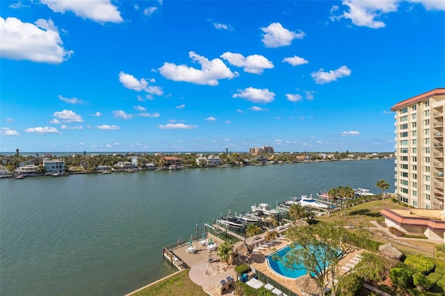 birds eye view of property featuring a water view