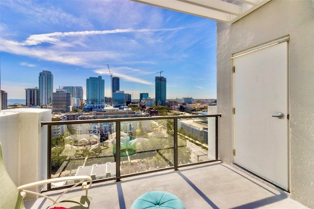 balcony featuring a city view