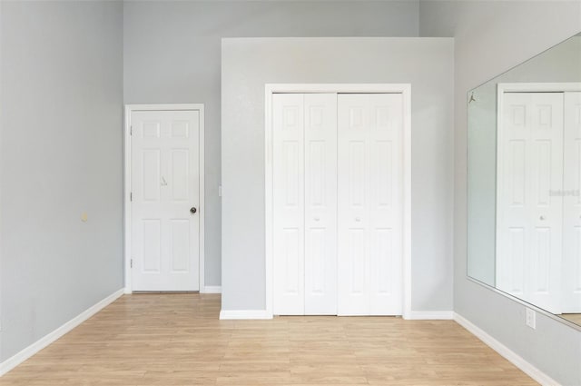 unfurnished bedroom featuring multiple closets