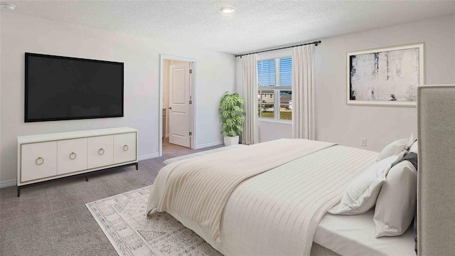 carpeted bedroom with a textured ceiling