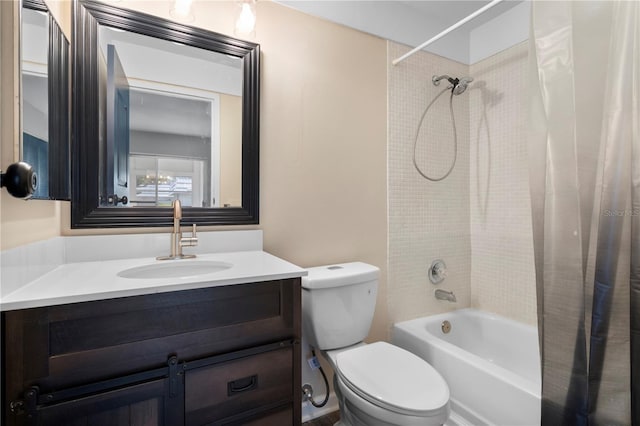 full bathroom featuring vanity, shower / tub combo, and toilet