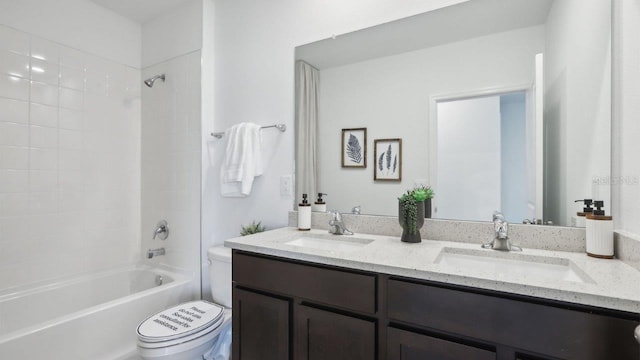 full bathroom featuring vanity, toilet, and shower / tub combination