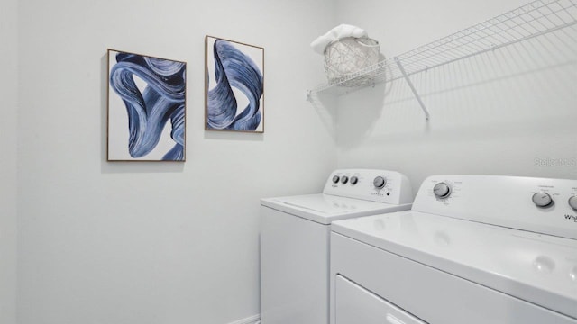 laundry area featuring separate washer and dryer