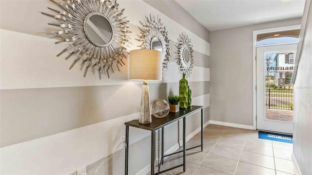 entrance foyer with light tile patterned floors