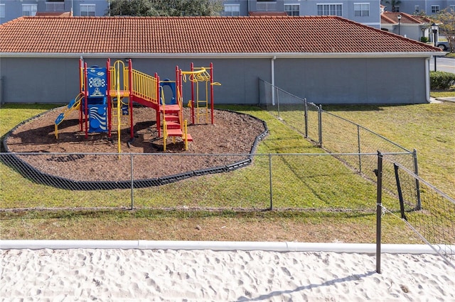 view of play area featuring a lawn