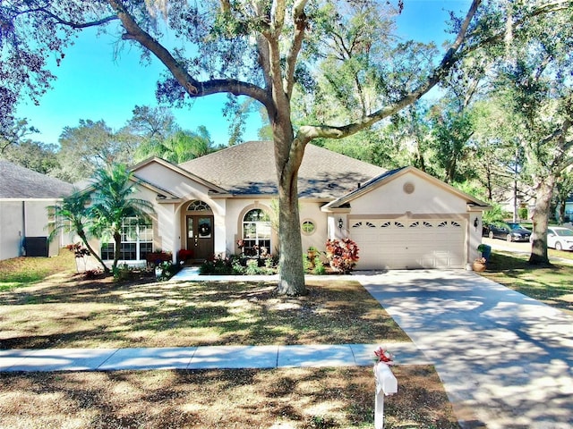 single story home with a garage