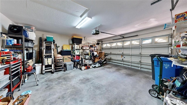 garage featuring a garage door opener