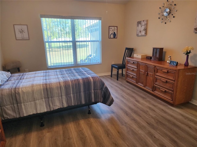 bedroom featuring hardwood / wood-style floors