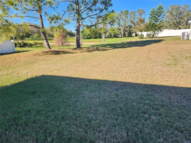 view of yard with central AC