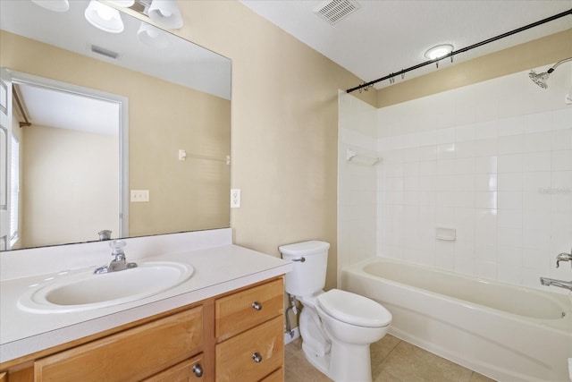 full bathroom with tile patterned floors, vanity, toilet, and shower / tub combination