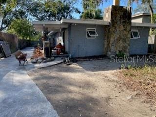 back of house featuring a patio