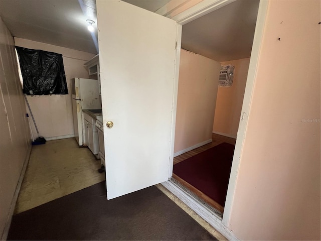 corridor with concrete flooring