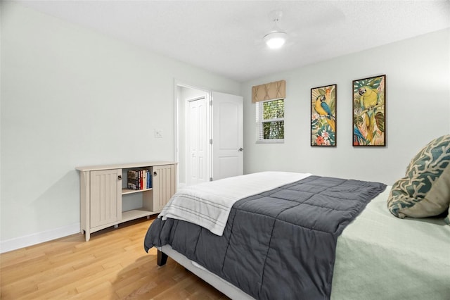 bedroom featuring hardwood / wood-style flooring