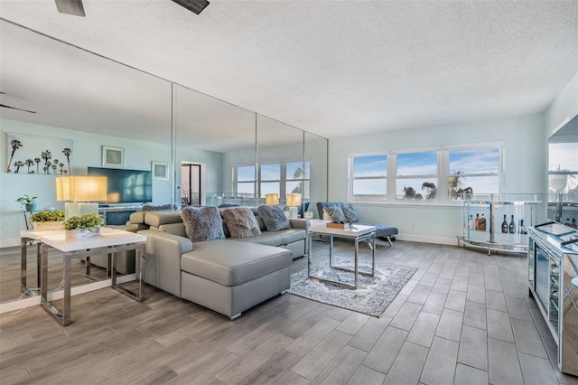 living room with a textured ceiling