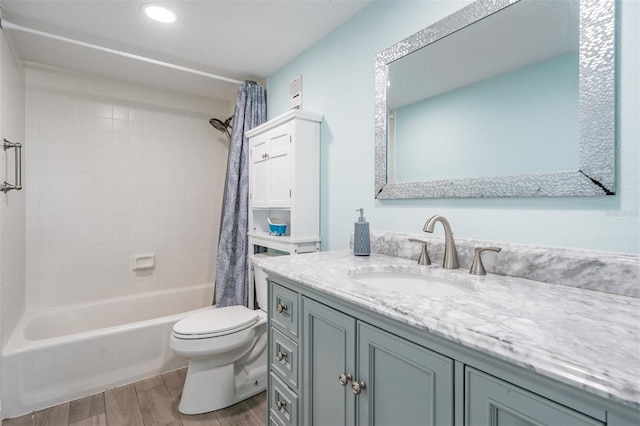 full bathroom featuring vanity, toilet, and shower / tub combo with curtain