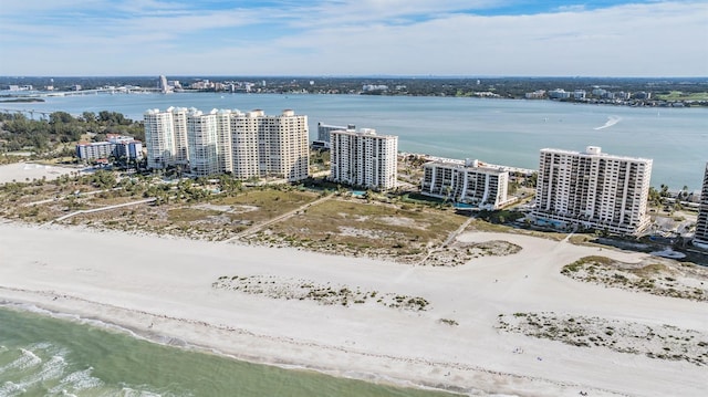 aerial view featuring a water view and a view of the beach