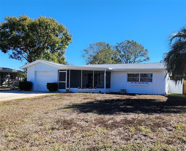 single story home with a garage