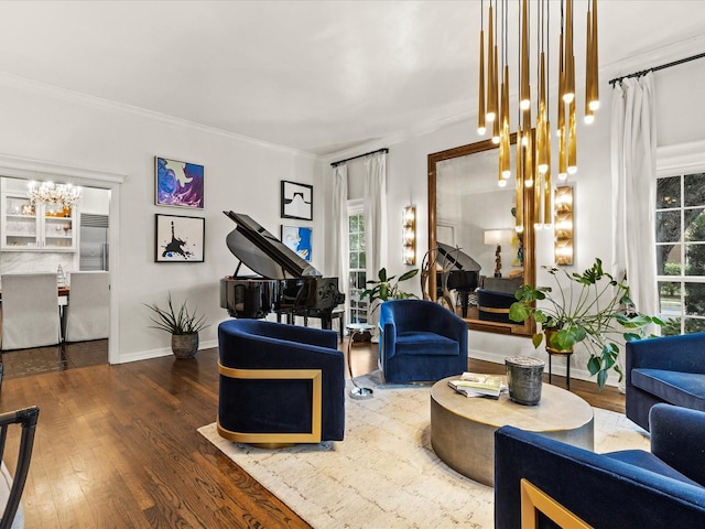 interior space with dark hardwood / wood-style flooring, ornamental molding, and a notable chandelier