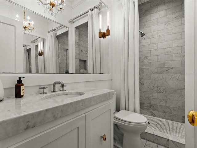 bathroom featuring vanity, an inviting chandelier, toilet, and curtained shower