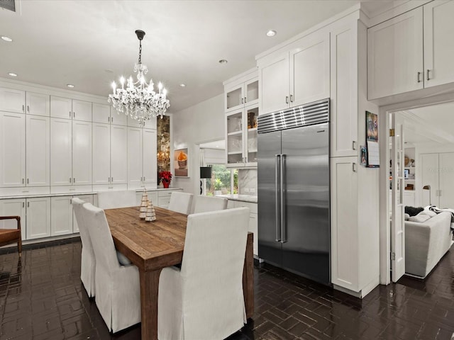 dining room with a notable chandelier