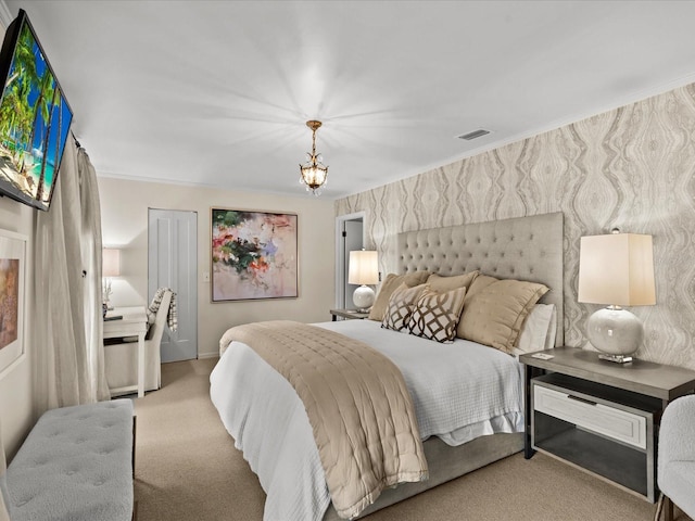 bedroom with light colored carpet, crown molding, and a chandelier