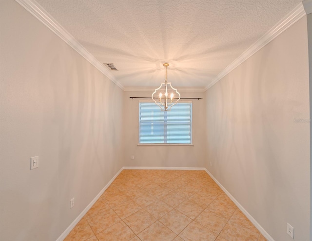 empty room featuring tile patterned flooring, a textured ceiling, crown molding, and a chandelier