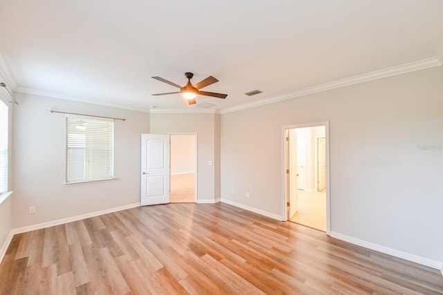 unfurnished room with ornamental molding, ceiling fan, and light hardwood / wood-style flooring