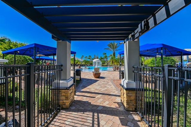 view of patio / terrace featuring a community pool