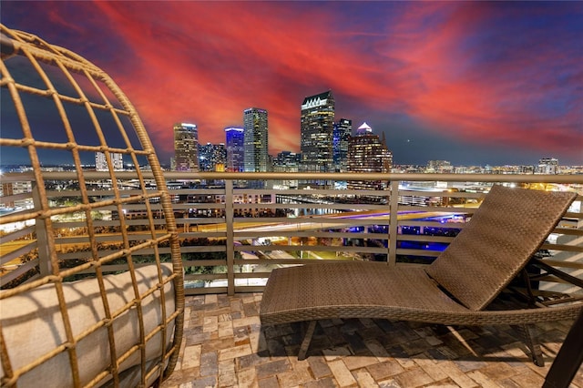 view of balcony at dusk