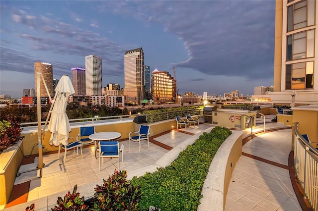 view of patio terrace at dusk