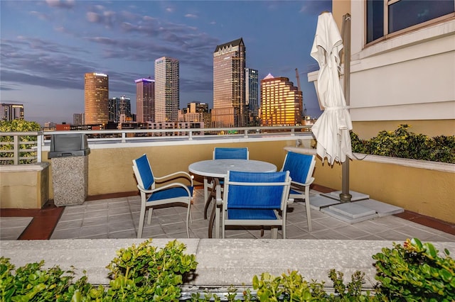 view of patio terrace at dusk