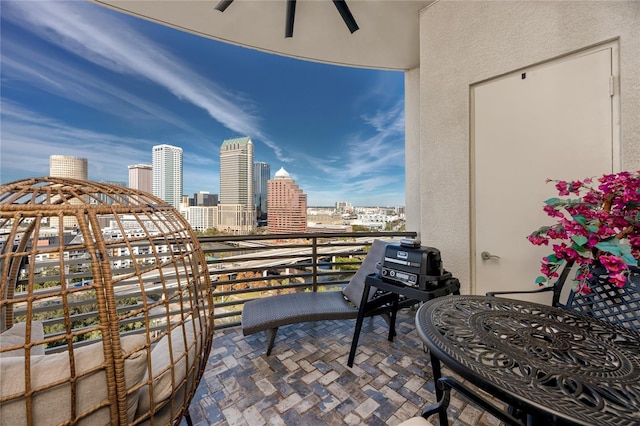 balcony featuring ceiling fan