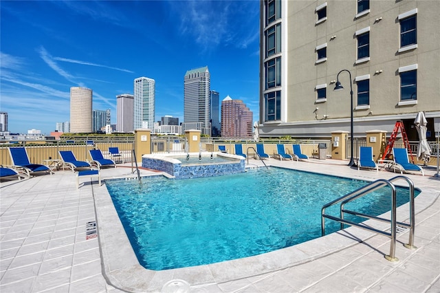 view of pool featuring a patio