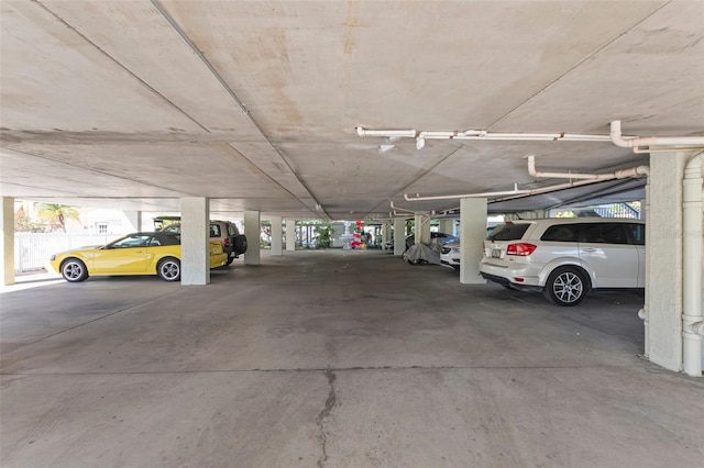 garage featuring a carport