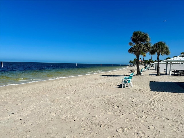 view of water feature with a view of the beach and a gazebo