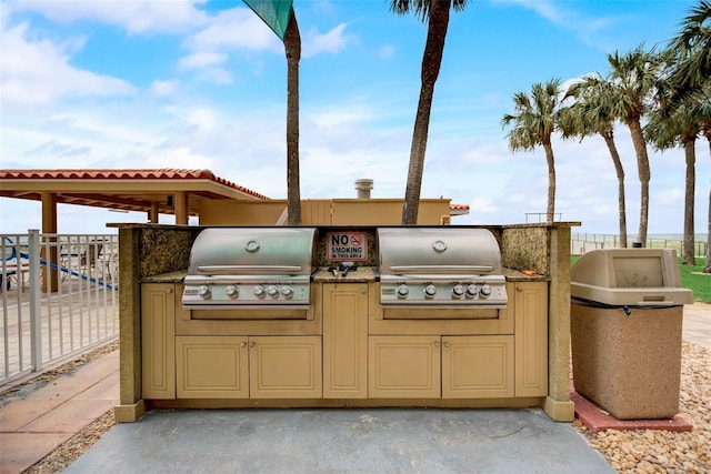 view of patio with grilling area and exterior kitchen