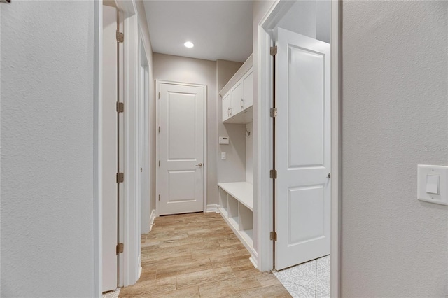 mudroom featuring light wood-type flooring