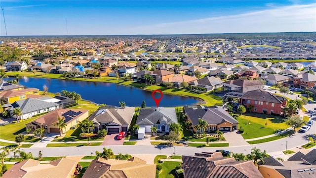 bird's eye view with a water view