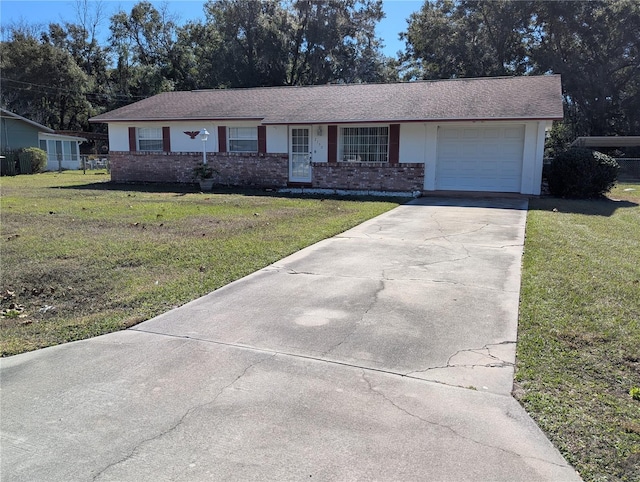 ranch-style house with a front yard and a garage