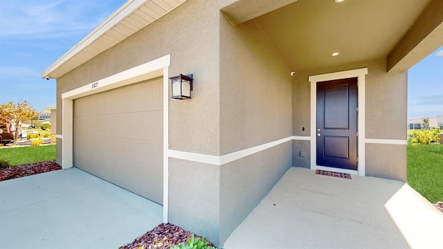 entrance to property with a garage