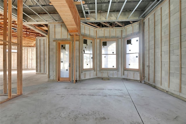 misc room with concrete flooring