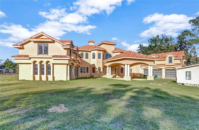 rear view of property with a lawn