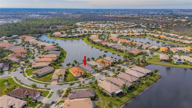 drone / aerial view featuring a water view